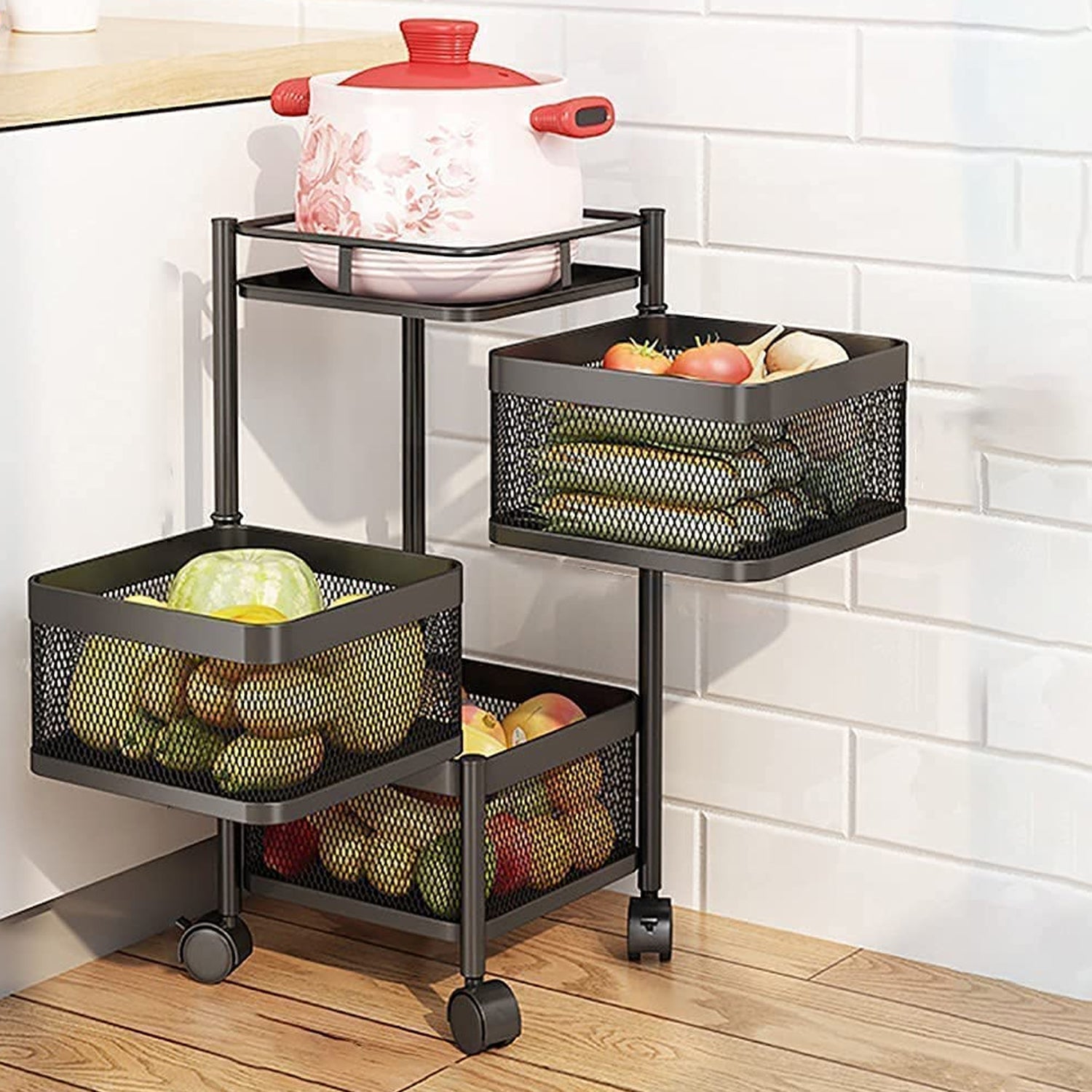 Metal kitchen trolley with wheels featuring three baskets for storage and organization in the kitchen