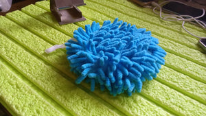 Bright blue microfiber cleaning duster for effective dusting on various surfaces