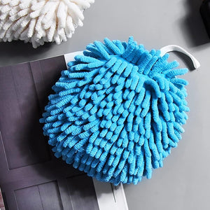 Blue microfiber cleaning duster with soft, absorbent fibers for effective dusting and cleaning