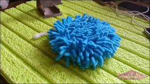 Bright blue microfiber cleaning duster for effective dusting on various surfaces