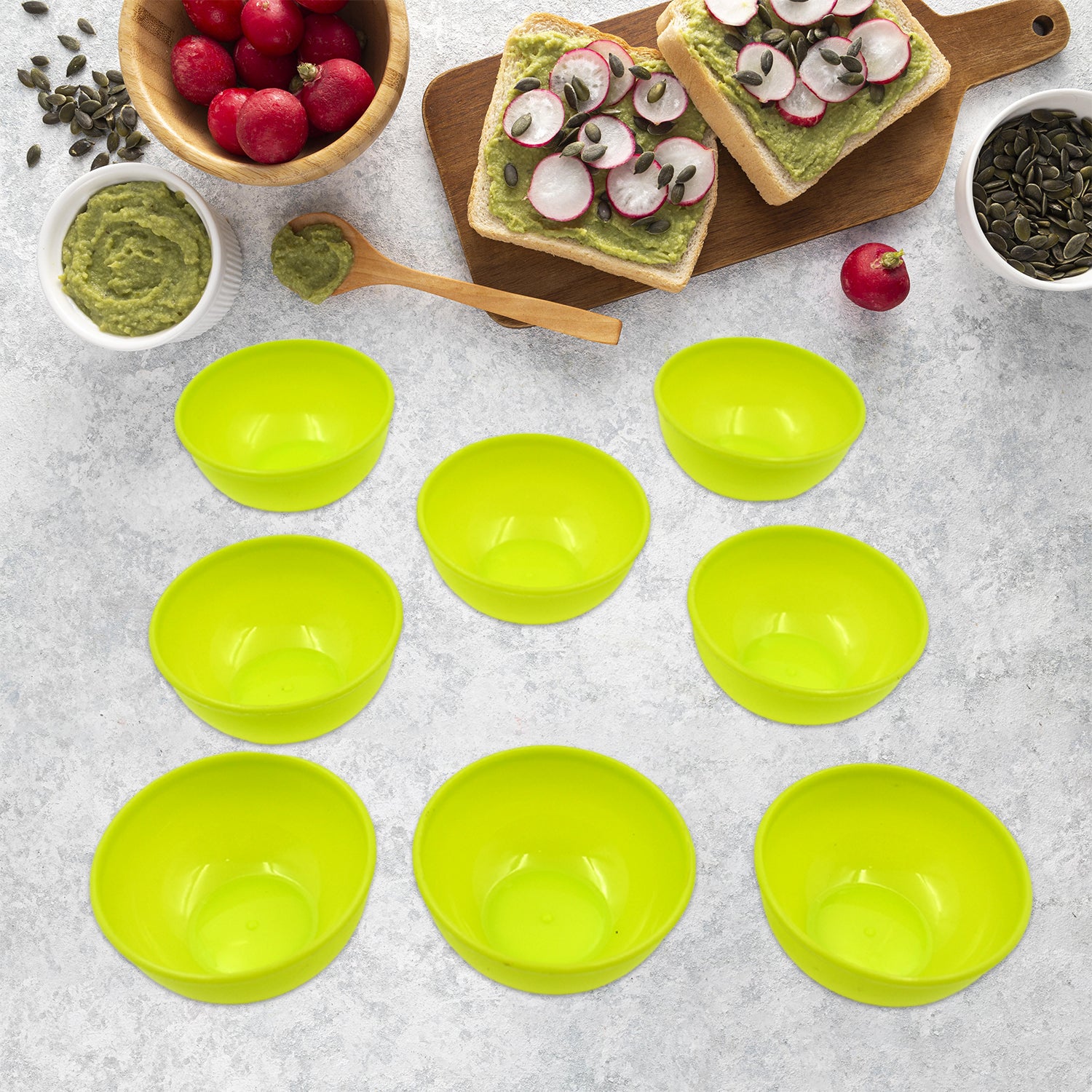Microwave safe plastic bowls set in bright green, ideal for meal prep and serving snacks