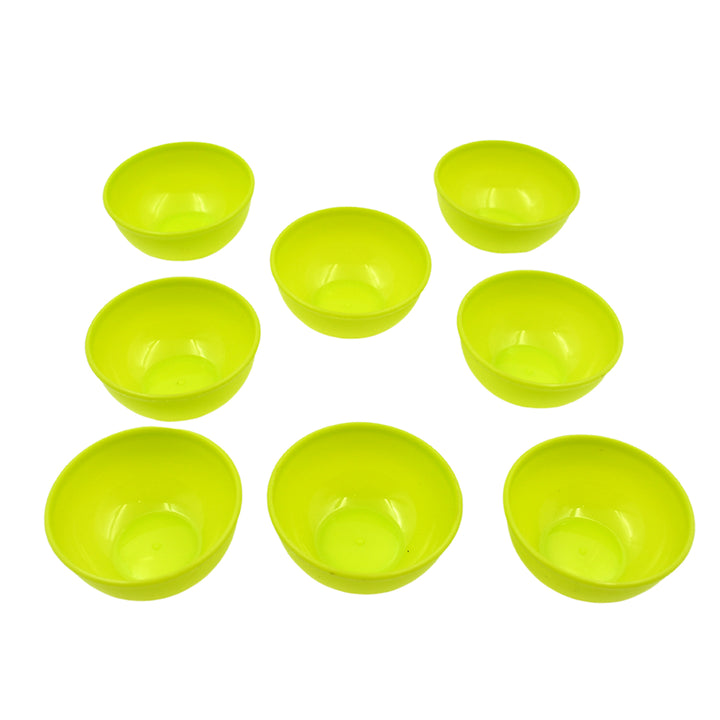 Set of eight bright green microwave safe plastic bowls for convenient food storage and serving