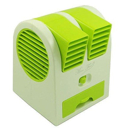 Compact green mini air conditioner for home with dual air vents for efficient cooling