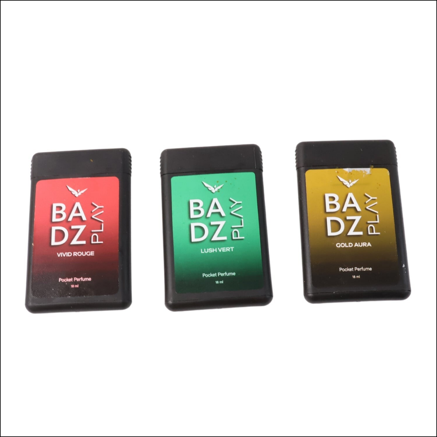 Set of three mini pocket perfumes by Badz Play in Vivid Rouge, Lush Vert, and Gold Aura scents