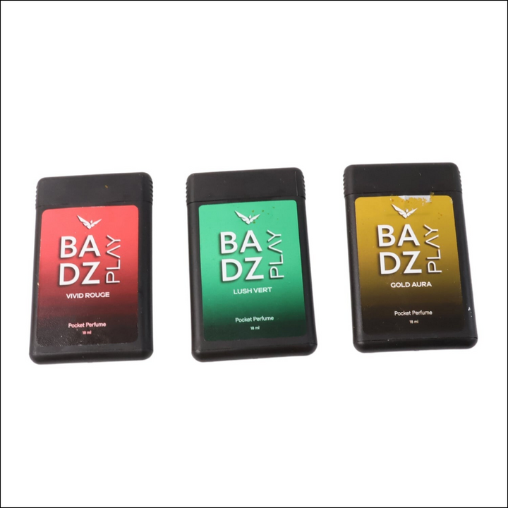 Set of three mini pocket perfumes by Badz Play in Vivid Rouge, Lush Vert, and Gold Aura scents