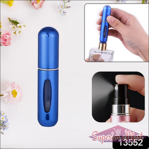 Portable perfume spray bottle in blue with easy refill design for on-the-go fragrance use