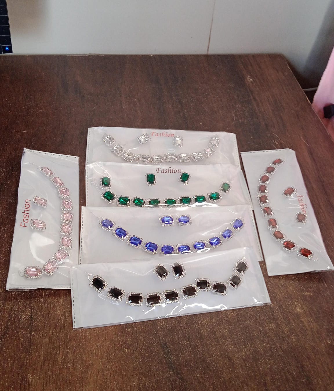 Mixed color jewelry set featuring various bracelets in elegant packaging for stylish accessories