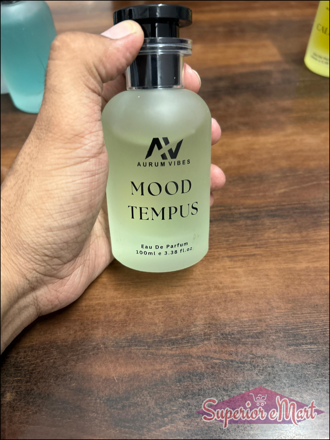 Aurum Vibes Mood Tempus Unisex Perfume 100ml in a clear bottle with a black cap