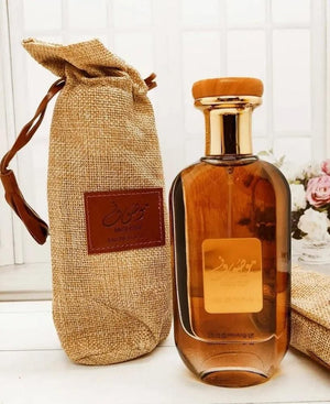 Mousuf inspired unisex perfume in elegant bottle with natural cork cap and decorative packaging