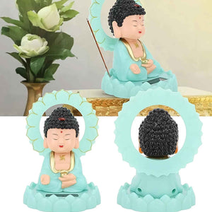 Decorative moving head Buddha ornament in pastel colors for calming home decor and meditation spaces