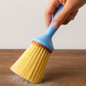 Superior eMart multi-purpose cleaning brush with blue handle and yellow bristles cleaning wooden surface