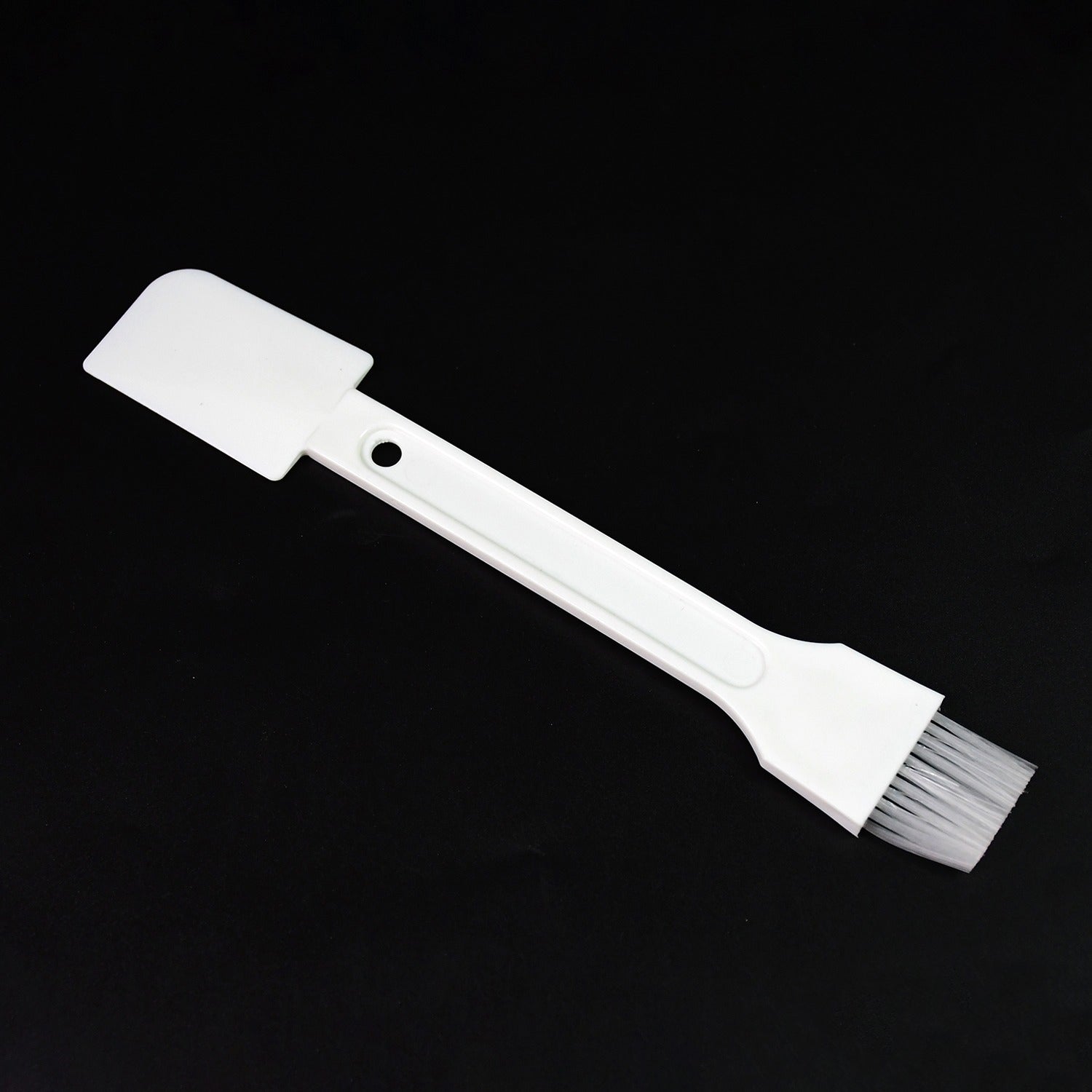 Superior eMart multi-purpose cleaning brush with a flat spatula and bristles for versatile cleaning tasks