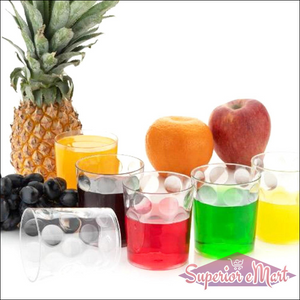 Colorful unbreakable drinking glasses set with assorted beverages and fresh fruits
