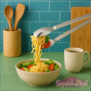2-in-1 stainless steel serving tong grabbing noodles from a salad bowl in a kitchen setting