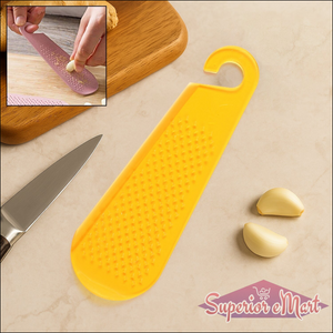 Yellow garlic and ginger grater tool for easy grating and meal preparation