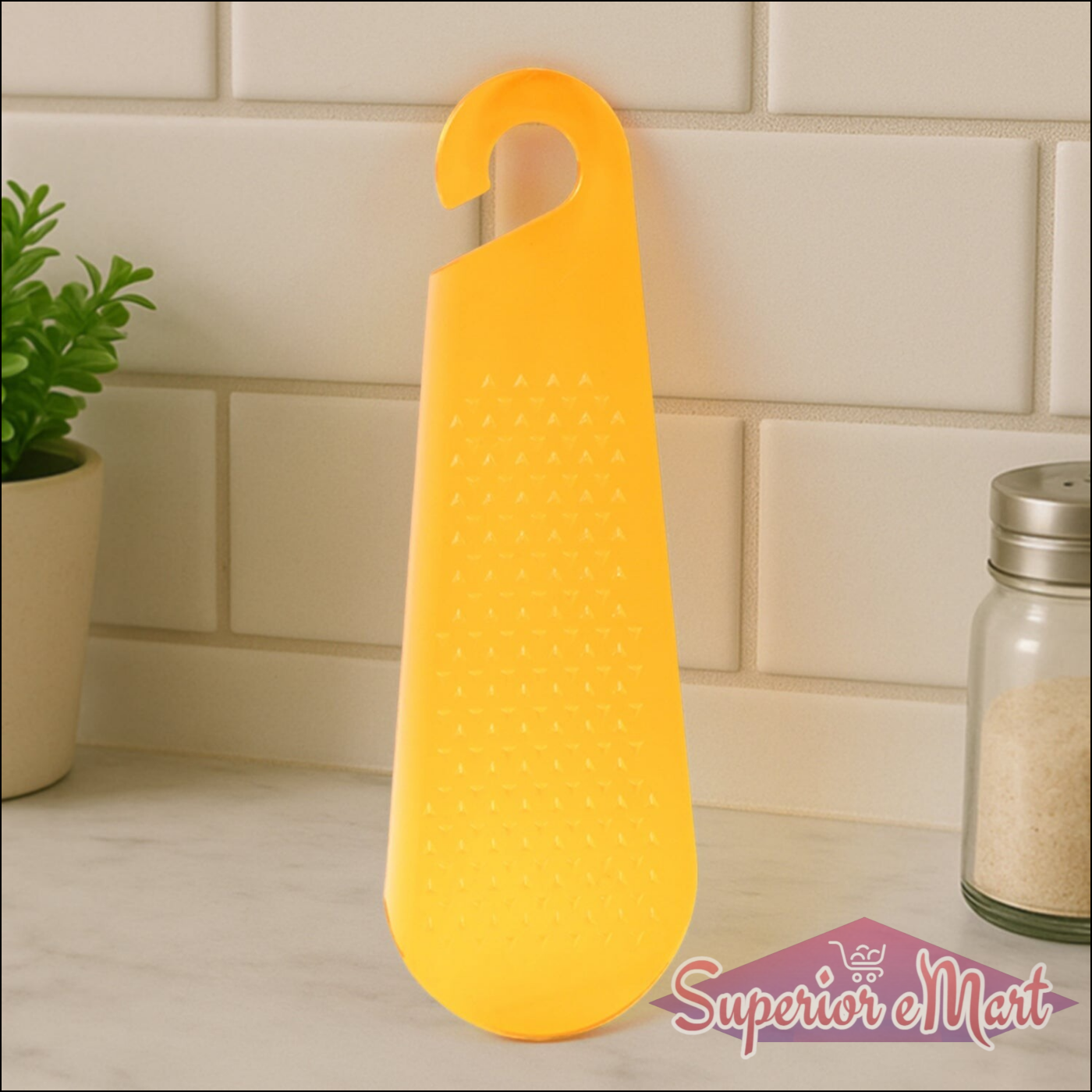 Yellow garlic and ginger grater tool with a convenient handle for easy grating in the kitchen