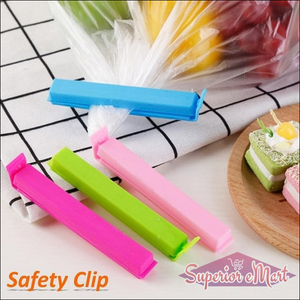 Colorful plastic pouch sealer clips in pink, green, and blue for easy food storage