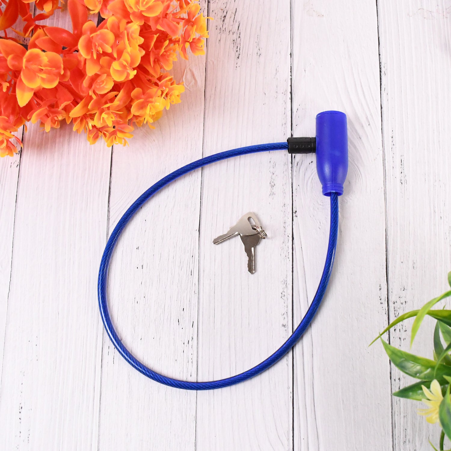 Blue multipurpose security lock with a key for securing automotive accessories and equipment