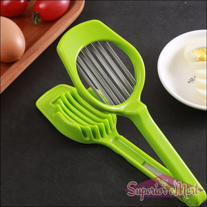 Green multipurpose slicer for fruits and eggs with ergonomic design for easy use
