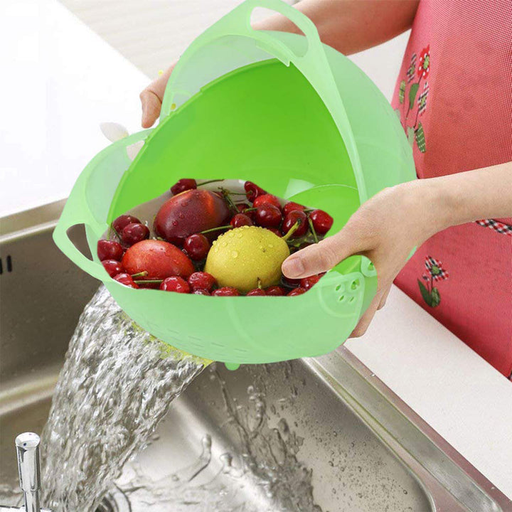 Superior eMart green multiuse fruit and vegetable bowl draining water over kitchen sink