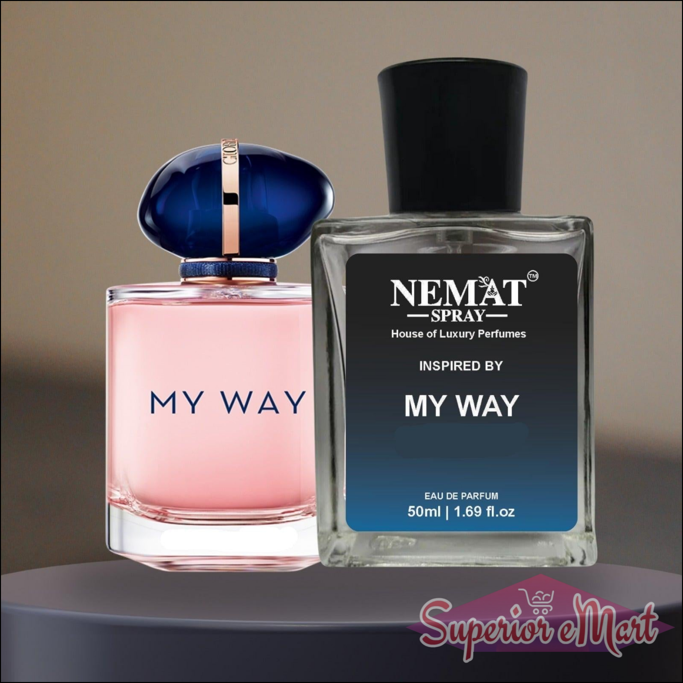 Pink 'My Way' glass perfume bottle with blue cap next to Nemat 'Inspired by My Way' 50ml spray on a dark pedestal.
