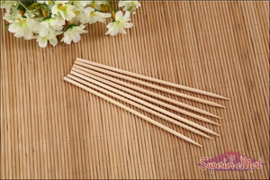 Natural bamboo skewers perfect for grilling and serving appetizers in the kitchen