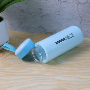 Leak proof glass water bottle with a light blue lid and modern design for everyday hydration