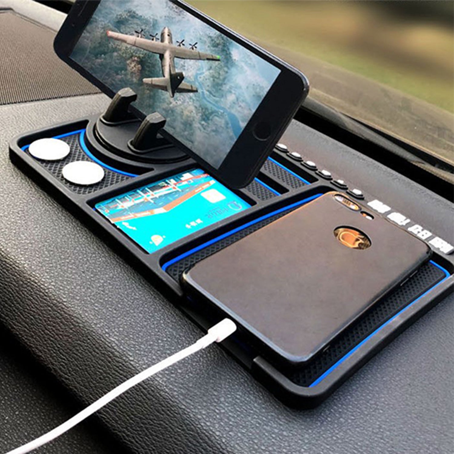 Non-slip car dashboard mat with phone holder and cable management for secure device placement