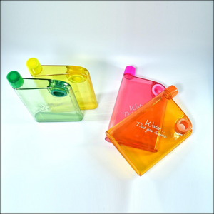 Colorful notebook style water bottle set in green, yellow, pink, and orange for easy hydration