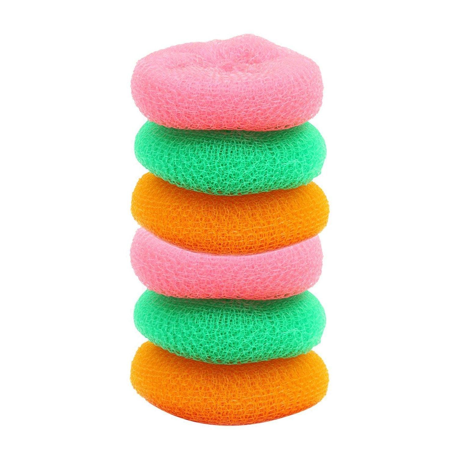 Colorful nylon scrubbers for dishes stacked in pink, green, and orange for efficient cleaning