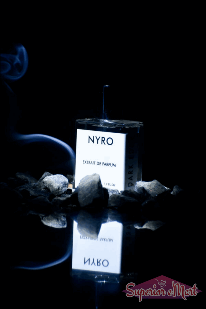Nyro Extrait de Parfum with Dark Edge in a sleek bottle surrounded by stones and smoke