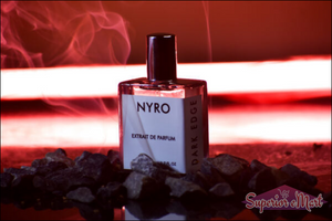 Nyro Dark Edge Extrait de Parfum Bottle on a Stone Surface with Smoke Background