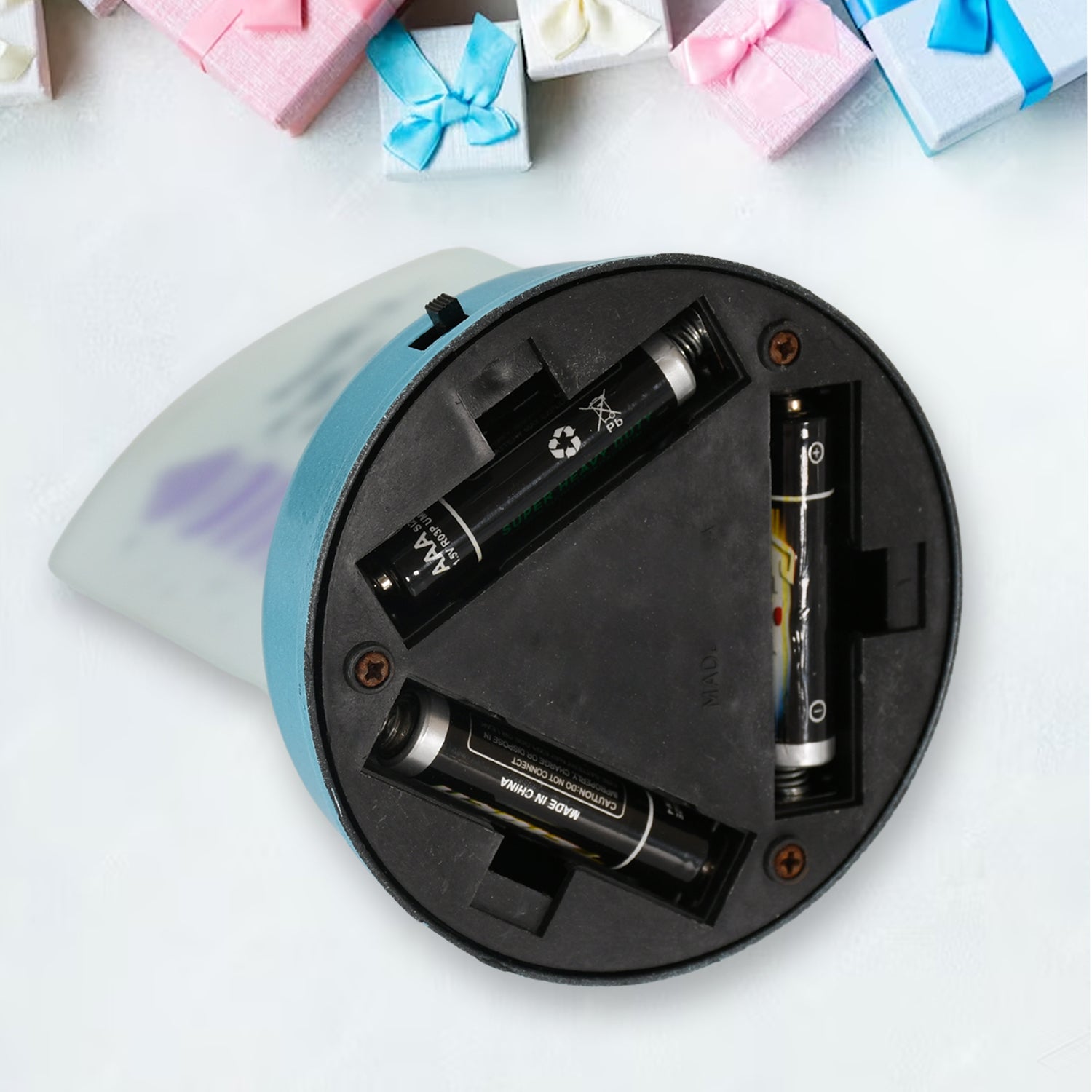 Base of Ocean Lighthouse night light showing battery compartment for easy power access