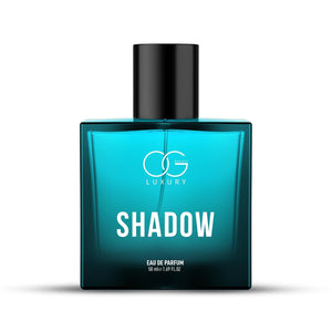 Og Beauty Luxury Shadow perfume bottle in blue with elegant design for a sophisticated fragrance experience