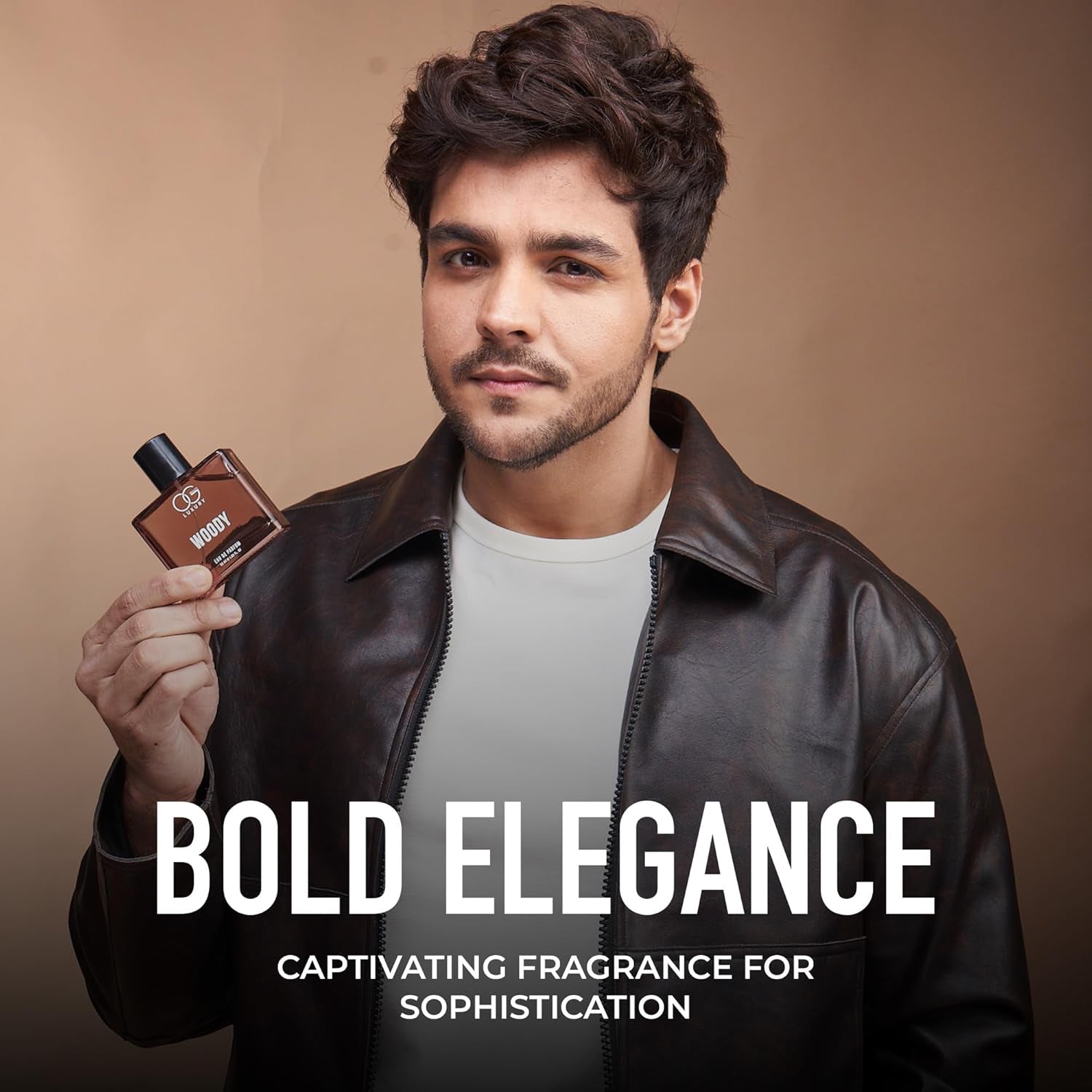 Superior eMart woody perfume for men in stylish bottle held by a man in a brown leather jacket