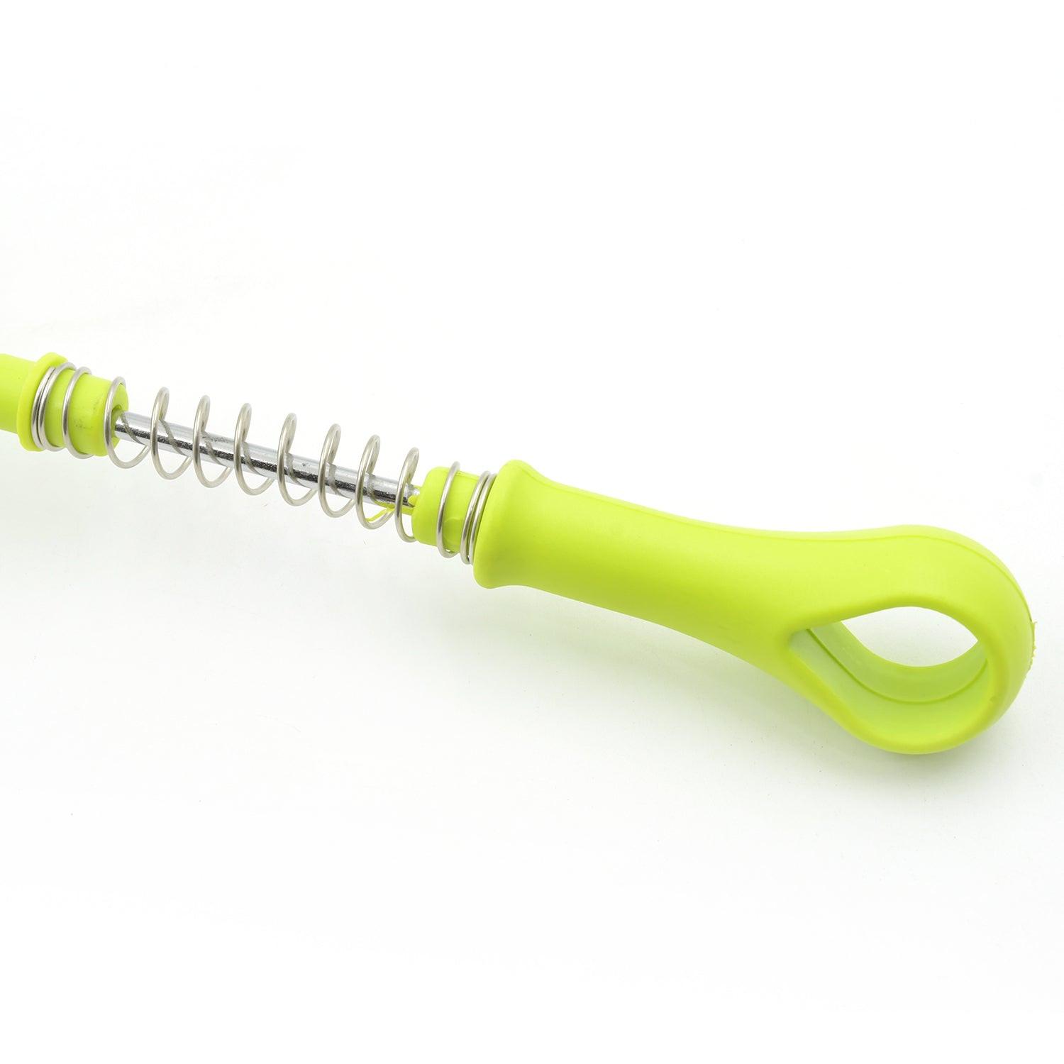 Green one-handed potato masher with ergonomic grip for effortless mashing in the kitchen