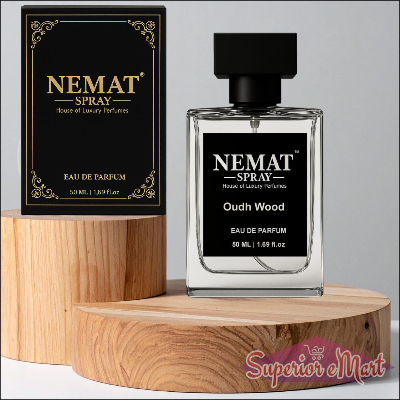 Nemat Oudh Wood 50ml Eau De Parfum. Clear glass spray bottle and black gold box on wooden pedestals.