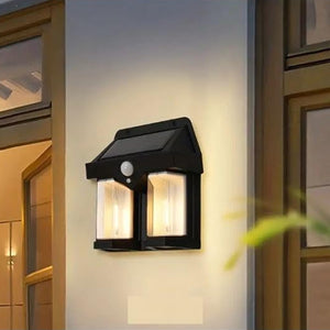 Outdoor solar wall lamp with dual lighting for enhanced outdoor ambiance and energy efficiency