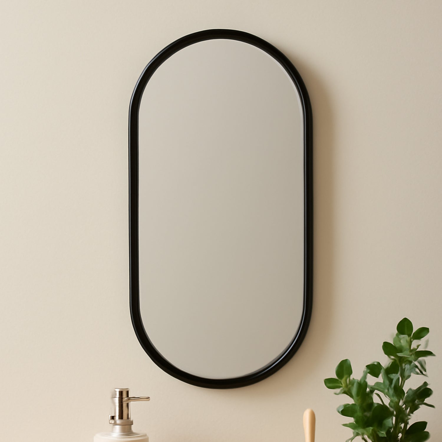 Oval Wall-mounted Bathroom Mirror (1 Pc) with a sleek black frame enhancing modern decor