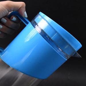 Blue Superior eMart 2000 ml water jug with glasses held by hand against black background