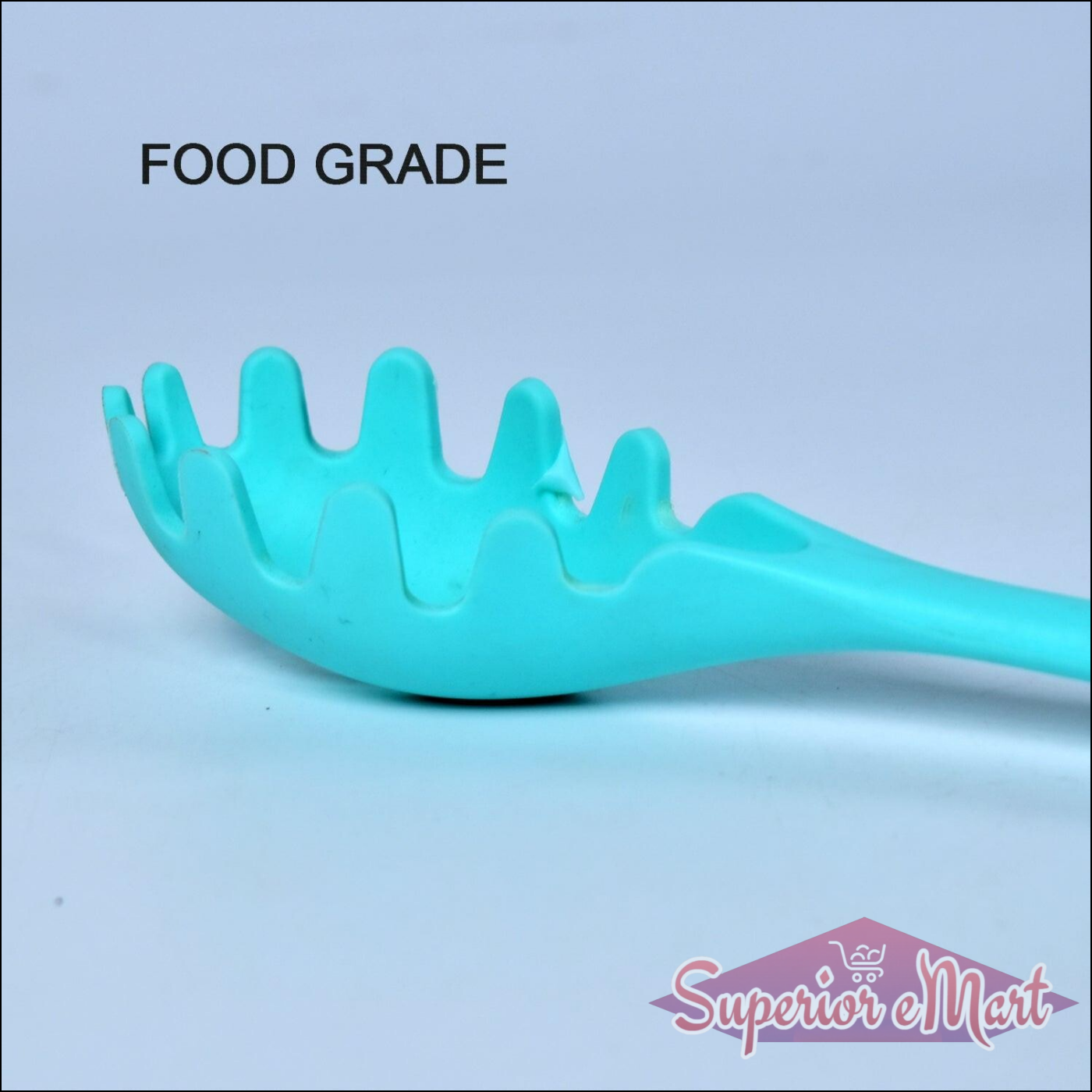 Turquoise heat resistant pasta fork made from food grade materials for safe cooking