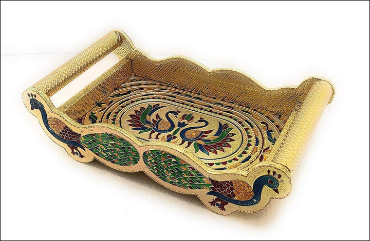 Elegant peacock design glass and tray set featuring vibrant colors and intricate detailing
