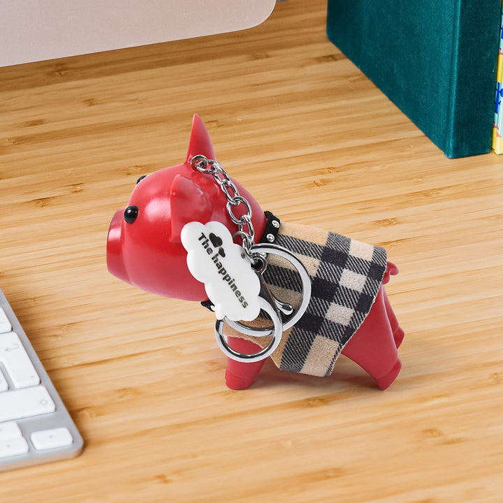 Cute pig charm accessory in a plaid outfit with keychain attachment for home decor