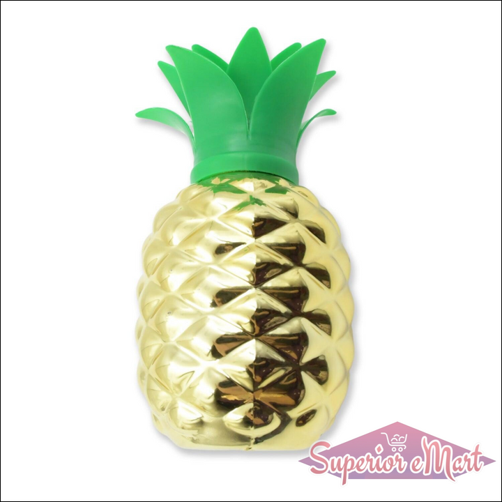 Gold pineapple cup with straw featuring a vibrant green crown perfect for summer drinks