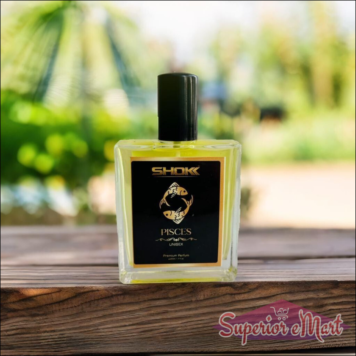 Pisces zodiac unisex perfume 50ml bottle on a wooden table with a blurred garden backdrop