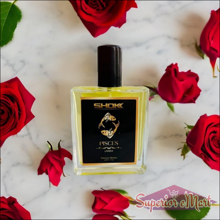 Pisces zodiac unisex perfume 50ml surrounded by red roses on marble surface