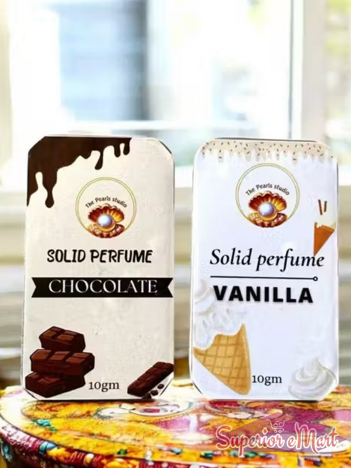 Two 10gm metal tins of chocolate and vanilla solid perfume by The Pearls studio with white illustrated labels.