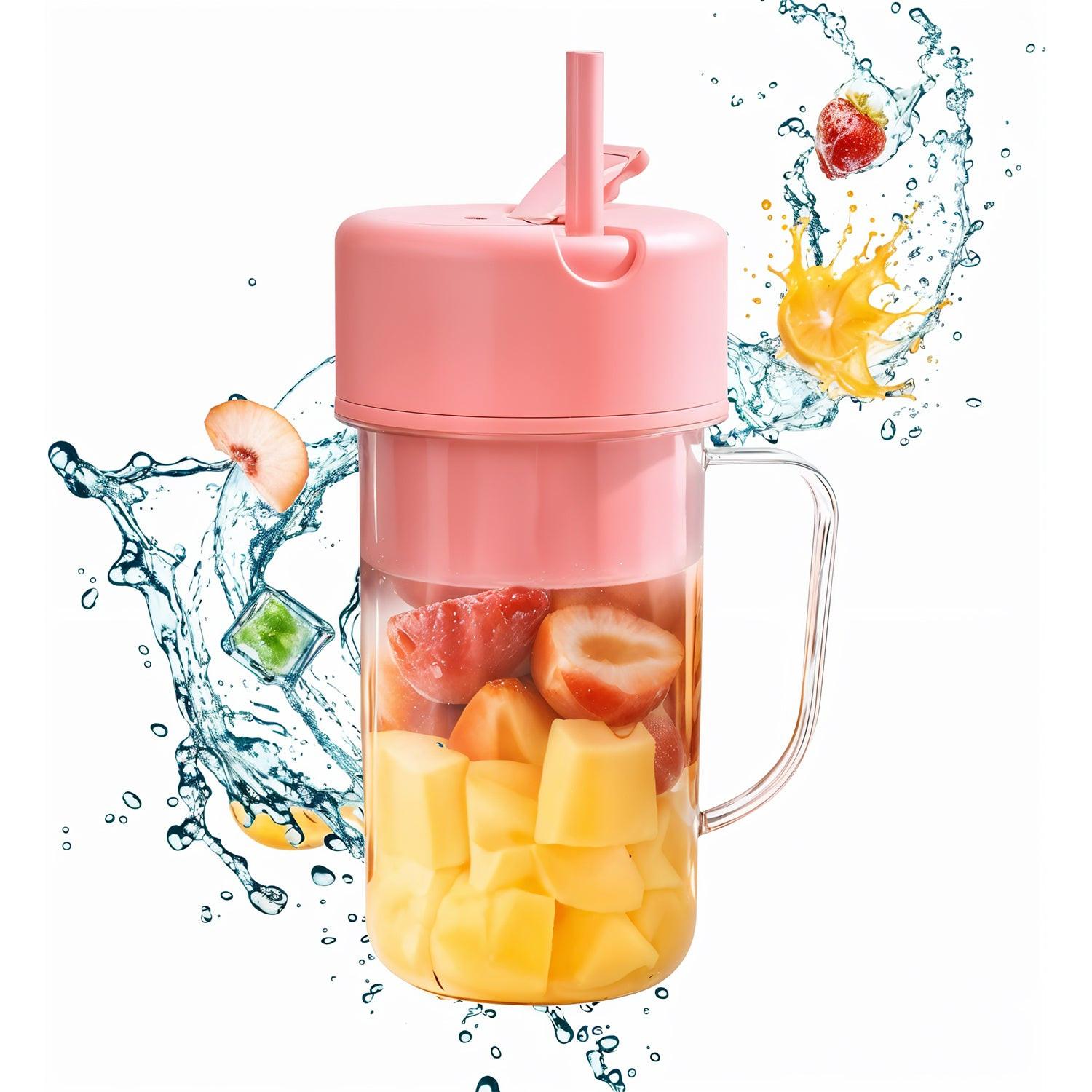 Pink portable blender juicer USB rechargeable with fruits ready for blending and splash effect