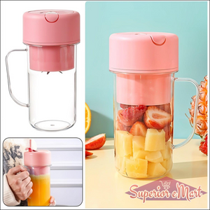 Pink portable blender juicer USB rechargeable with fruits ready for blending and easy grip handle