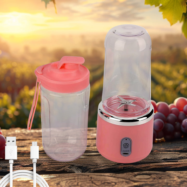 Portable juicer blender in pink with USB charging, perfect for making smoothies on the go